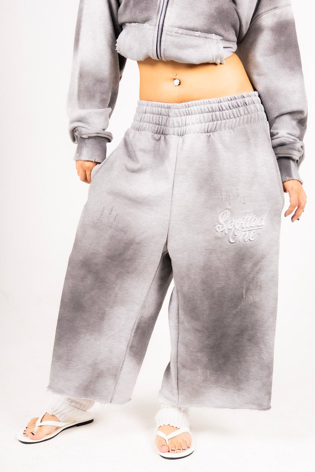 Gray Spotted One long shorts styled on body