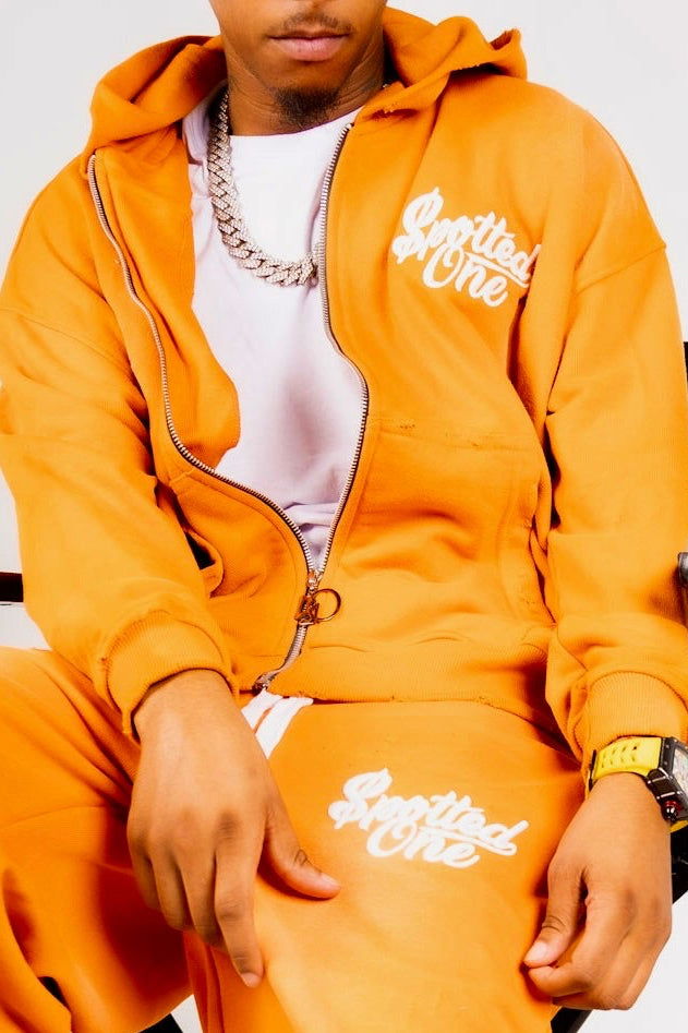 Orange Spotted One long shorts styled on body