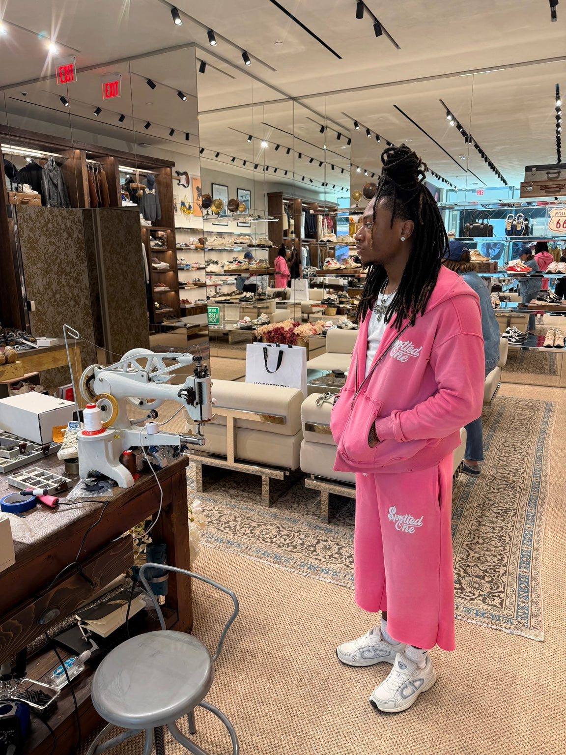 Pink Spotted One Essentials zip-up styled on body; shorts sold separately